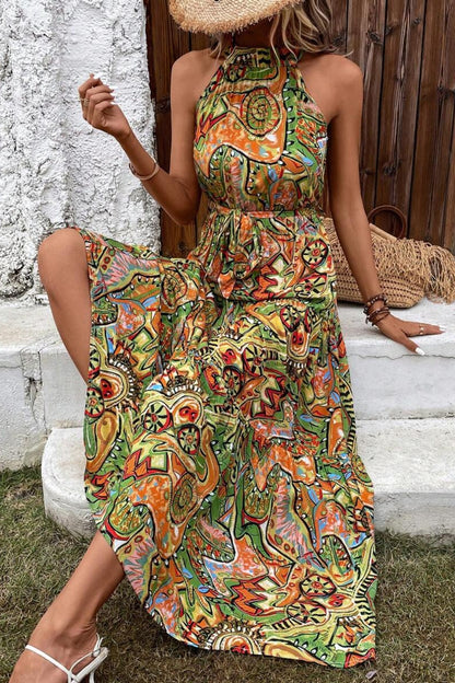 Beautiful halter dress in fun abstract print in greens yellow oranges pinks and blues maxi dress great for a variety of occasions from date night to wine tasting