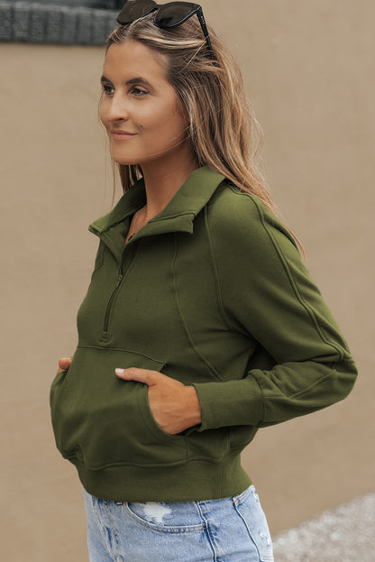 Sudadera con cremallera y cuello alto con manga acanalada y abertura para el pulgar en verde