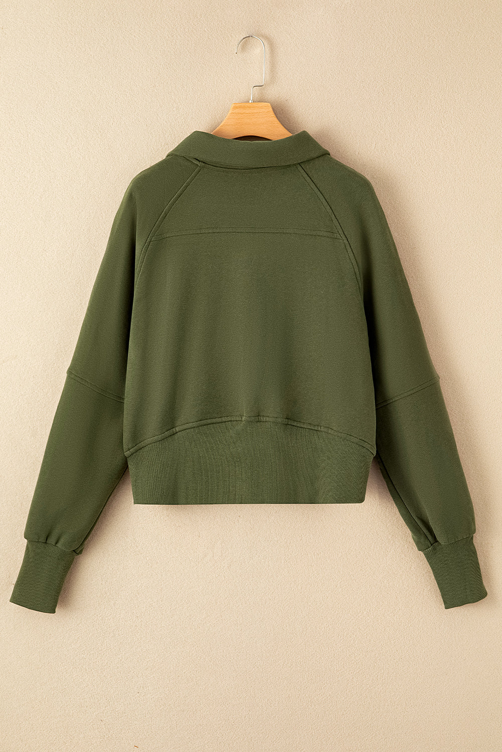 Sudadera con cremallera y cuello alto con manga acanalada y abertura para el pulgar en verde