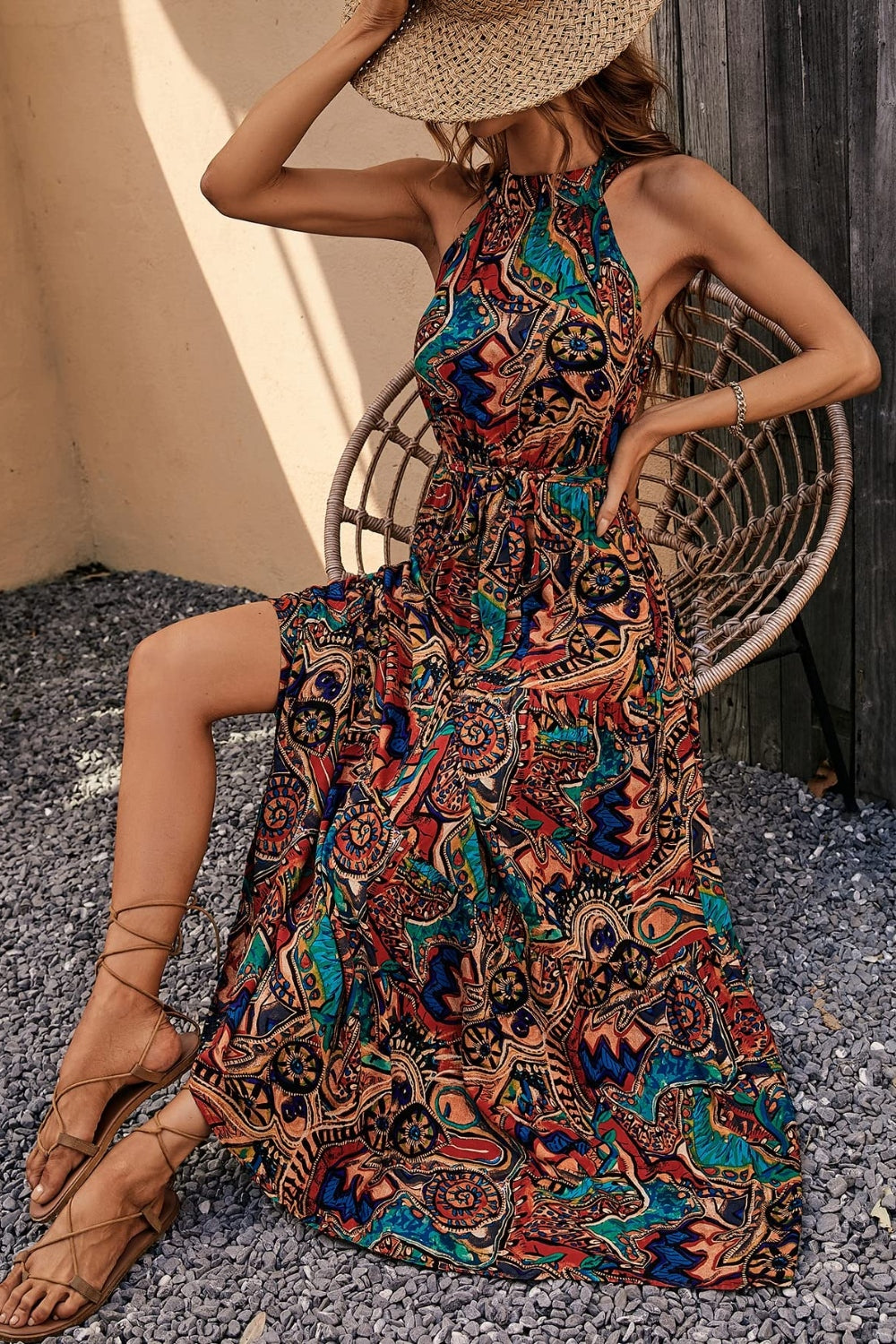 gorgeous halter maxi dress in a variety of colorful prints. Southwestern vibe with jeweled blue rust navy peach and black colors. Perfect for an evening out or a special daytime event